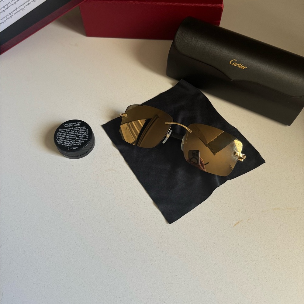Cartier grey buffalo horn sunglasses with grey lenses, golden finishes